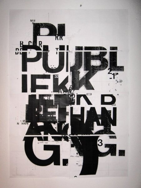 Public Space Poster. This works for me because while at first glance it may appear to be a chaotic mess, there is upon closer examination a sense of order, hierarchy, and structure. It's almost delicate, in the sense that eliminating or changing one part would throw off the rest.